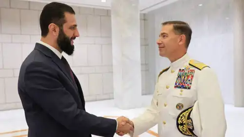 الرئيس السوري أحمد الشرع والأدميرال براد كوبر