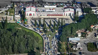 قاعدة حميميم يظهر فيها اللاجئون من الساحل 