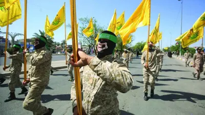 مقاتلون بإحدى الفصائل العراقية المسلحة