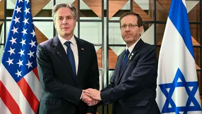 إسحق هرتسوغ وأنتوني بلينكن