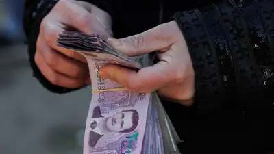 العملة السورية