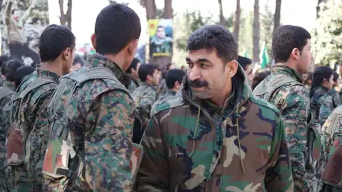 سيبان حمو في مراسم عسكرية بعفرين