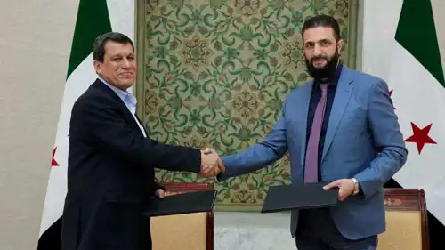 الرئيس السوري وقائد قسد