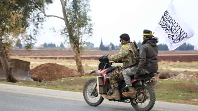 مسلحون من المعارضة في مدينة "الرستن"