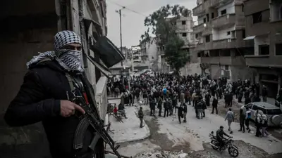 مسلح فلسطيني في مخيم اليرموك جنوب دمشق