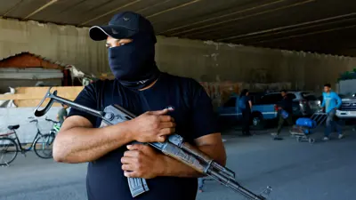 عنصر تابع للأمن السوري في جرمانا