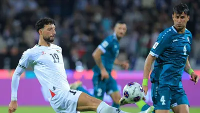 من مباراة فلسطين والعراق