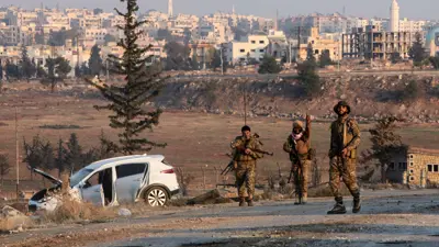 مسلحون على مشارف مدينة حلب