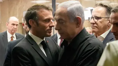 نتنياهو وماكرون في لقاء سابق