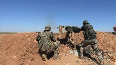 جانب من اشتباكات القوات الكردية والجيش التركي