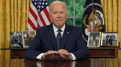 جو بايدن خلال خطابه في المكتب البيضاوي