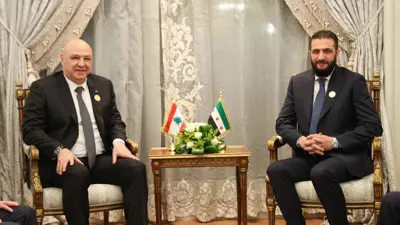 الشرع وعون خلال اللقاء في القاهرة