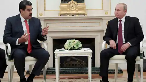 بوتين ومادورو في لقاء سابق