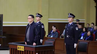 نائب رئيس الاتحاد الصيني لكرة القدم أثناء محاكمته