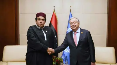 لقاء سابق بين محمد المنفي وغوتيريش