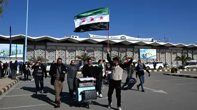 سوريون عائدون عبر مطار دمشق الدولي
