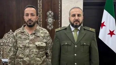 وزير الدفاع السوري مرهف أبو قصرة وأحمد الهايس