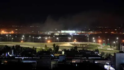 دخان متصاعد إثر قصف سابق لمحيط مطار أربيل