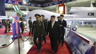 سيرغي شويغو وكيم جونغ أون (أرشيفية)