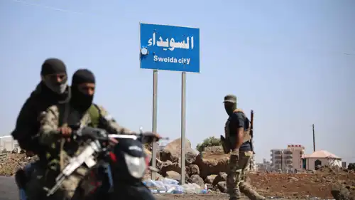 صورة سابقة لمقاتلين من العشائر والبدو في السويداء