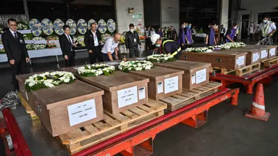 توابيت لعمال تايلانديين قتلوا في 7 أكتوبر