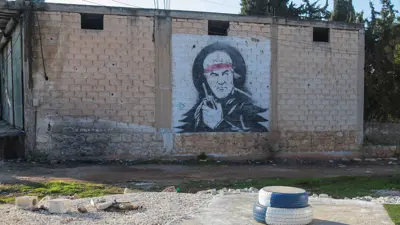 رسم على جدار في حلب للجنرال الإيراني قاسم سليماني