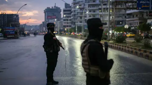 رجلا أمن في مدينة اللاذقية