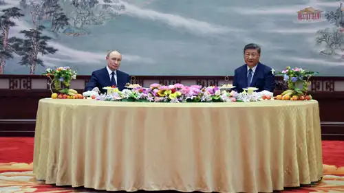 لقاء سابق بين بوتين وشي جين بينغ