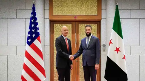 لقاء سابق بين الشرع وباراك