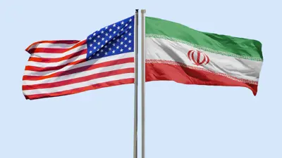 العلمان الإيراني والأمريكي