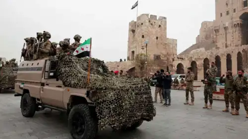 قوات سورية خلال عرض عسكري سابق في حلب  