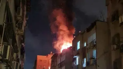 النيران تشتعل في موقع سقوط أحد الصواريخ الإيرانية