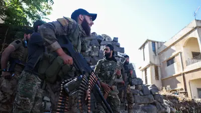 عناصر من القوات الحكومية في السويداء