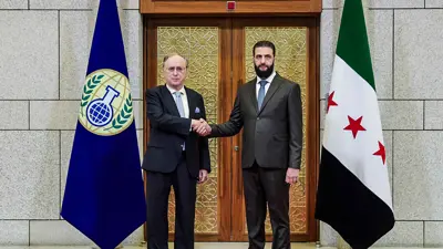 الرئيس السوري ورئيس منظمة حظر الأسلحة الكيميائية