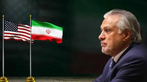 الوزير الباكستاني إسحاق دار ويبدو علمي إيران وأمريكا