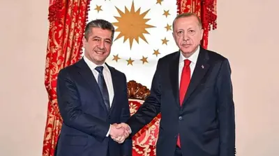 الرئيس التركي رجب طيب أردوغان ورئيس حكومة كردستان مسرور بارزاني