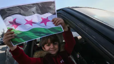 من احتفالات السوريين بسقوط نظام الأسد