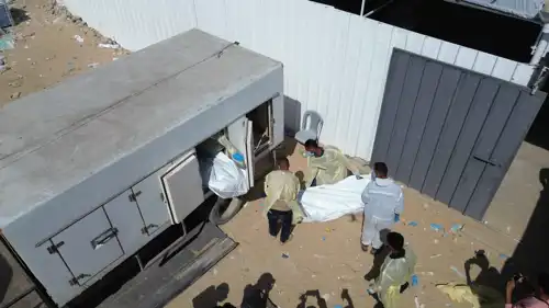 خلال تسلم دفعة سابقة من جثث الفلسطينيين