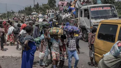 سكان من الكونغو الديمقراطية أثناء فرارهم من الصراع