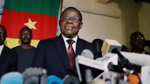 موريس كامتو خلال مؤتمر صحفي سابق