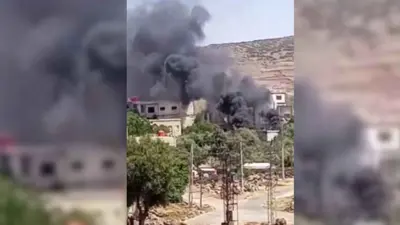  صورة متداولة للحرائق في حي المقوس بالسويداء