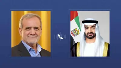 الشيخ محمد بن زايد آل نهيان والرئيس الإيراني