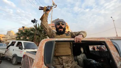 أحد العناصر المسلحة في حماة